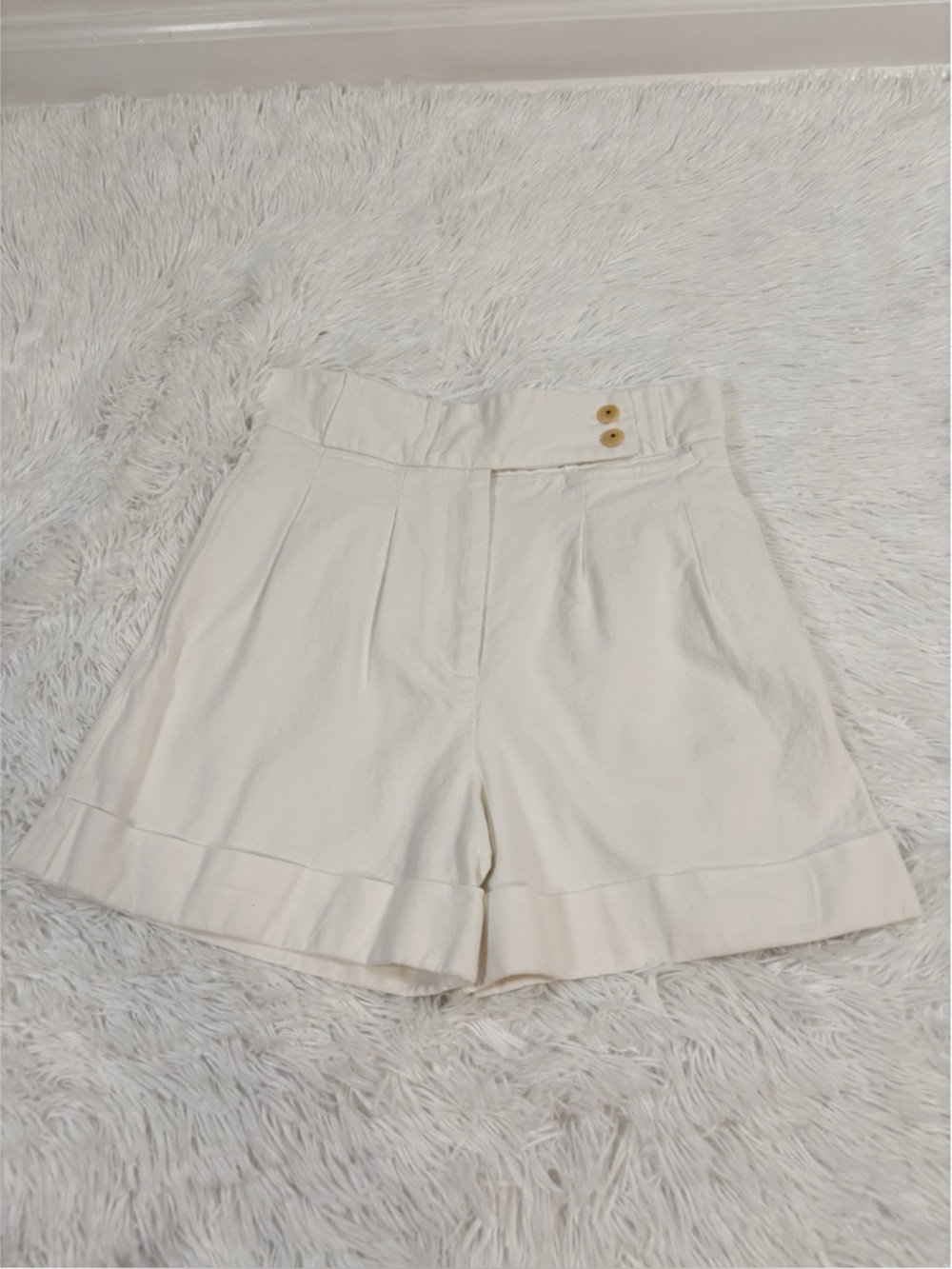 Karen Walker women's High-Waist pleated front Shorts‎ in white roll cuffs